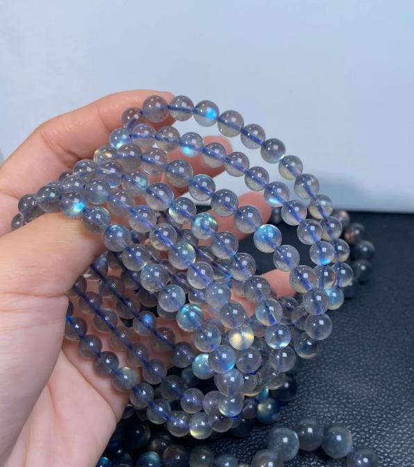 Labradorite bead strands showing blue and green flash